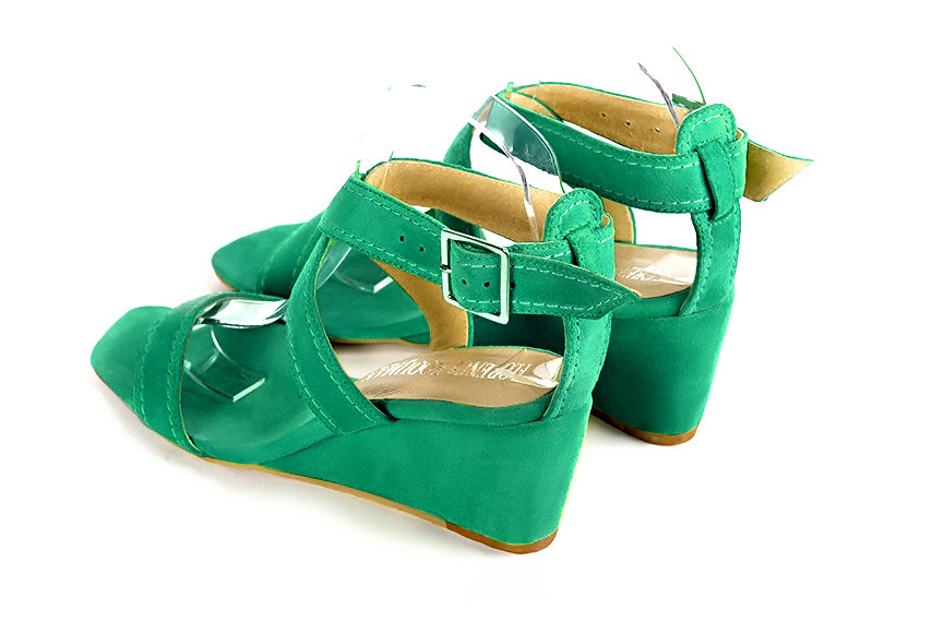 Women's emerald green elegant fully open cross straps sandals. Square toe. Medium wedge heels - Rear view